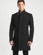 A classic overcoat is tailored with modern proportions from fine Italian wool, highlighting a sleek, streamlined silhouette and a removable nylon vest for long-lasting style, warmth and versatility.Button-frontStand collarChest welt, waist flap pocketsRear ventFully linedAbout 39 from shoulder to hemWoolDry cleanImported