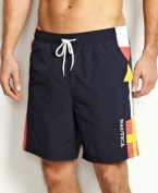 Capture the flag! Get into the fun of playing in the sun with these flag swim trunks from Nautica.