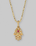 The hamsa, or open hand, a graceful symbol of protection in many cultures, becomes a shimmering necklace, set with diamonds and a single ruby, suspended from a 14k gold ball chain. Diamonds, 0.05 tcw Ruby, 0.02 ct 14k yellow gold Chain length, about 16 Pendant, about ½L x ¼W Lobster clasp Imported