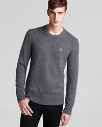 The exposed seams give this crewneck sweater a deconstructed look, but the headline here is soft, warm cashmere, a luxurious addition to your wardrobe of classic essentials.