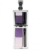 Directly inspired from the luggage tag of YSL handbags, this limited edition collector make-up palette contains one harmony of two eyeshadow shades: a deep purple and a silvery lavendar. The palette contains an applicator for a precise make up result. With matte and bright silver contrasts and an engraved cover, this fashion accessory can be attached to handbag, belt, or even a key ring. 4½H X 1¾W X ¾L 