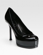 Sleek patent leather in a shapely surprise perfect from day to night.Self-covered pin heel, 4¼ Self-covered hidden platform, 1¼ Compares to a 3 heel Round toe with seam detail Leather lining and sole Padded insole Made in ItalyOUR FIT MODEL RECOMMENDS ordering true size.. 