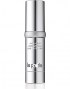 A line-filling formula for the eye area that is an effective alternative to injectable fillers. A natural ingredient, extracted from a tree that grows in India, plumps the skin immediately to minimize the appearance of lines and wrinkles, while various peptides help rebuild the skin's structure over time. 0.5 oz. 