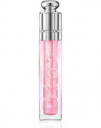 Clear like crystal Jelly Gloss is lightly tinted in vivid summer shades for shiny, radiant lips. Enriched with a polymer gel, the vinyl texture immediately delivers volume to the lips, providing long-lasting comfort and optimal hydration. This must-have accessory comes in four shades that will give your lips an instant radiance boost: Two translucent shades: Sweet Rose and Sweet Peach Two sparkling shades: Luminescent Rose and Luminescent Peach 