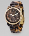 Deep earth tones style this sports watch with stainless steel case and CRYSTALLIZED - Swarovski Elements at each index. Face, about 1½ diameter Tortoise acrylic bracelet Mother-of-pearl dial Knurled bezel Multifunction movement Imported