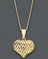 Give her your heart. This pretty heart-shaped pendant features a textured glitter design set in 14k gold. Approximate length: 18 inches. Approximate drop: 3/4 inch.