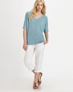 A touchable design made from soft linen, this top features a feminine v-neckline, modern dolman sleeves and a relaxed-yet-flattering fit. V-neckElbow-length sleevesFront and back seamPull-on styleAbout 26 from shoulder to hemLinenHand washImported Model shown is 5'10 (177cm) wearing US size Small. 