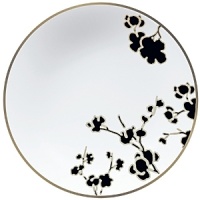 From Raynaud in Limoges porcelain, a modern, Asian-influenced pattern in black, white, and yellow with platinum bordering. Mix in yellow saucers and buffet plates to make the pattern pop.