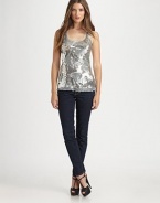 Glittering sequins swirl over the mesh front of this scoopneck tank for a look that's simply-dazzling.ScoopneckWide strapsSequined mesh frontAbout 27 from shoulder to hemFront: 50% viscose/45% rayon/5% lycraBack: rayonHand washImportedModel shown is 5'9 (175cm) wearing US size Small.