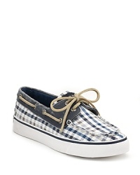 Pretty preppy. Sperry Top-Sider's plaid boat shoes take the classic staple even further uptown.