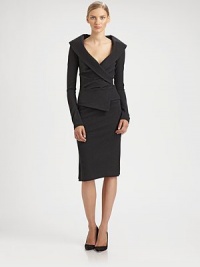 The classic pencil skirt, updated with a slit, asymmetrical hemline.Bias seamAsymmetrical hemlineFront slitAbout 33 long84% wool/11% polyamide/5% elastaneDry cleanImported of Italian fabricModel shown is 5'11 (180cm) wearing US size 4. 