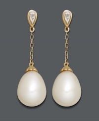 Sophisticated style perfect for the office or an evening out. Elegant drops feature cultured freshwater pearls (8 x 11 mm) strung from delicate chains crafted in 14k gold with sparkling diamond-accented posts. Approximate drop: 1-1/10 inches.