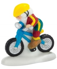 Accustomed to the snow, this daring commuter braves the streets to Santa's workshop on an electric-blue bike. A whimsical figurine from North Pole Village, also by Department 56.