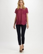 A silk button-down blouse offering a relaxed fit and everyday-chic look.Round neckShort sleevesButton frontAbout 26 from shoulder to hemSilkDry cleanImported