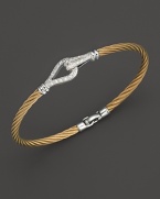 Yellow gold and steel cable bangle with diamond pavé. Designed by Charriol.