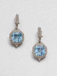 From the Estate Collection. Beautifully faceted blue topaz stones set in intricately designed, sterling silver accented with dazzling white sapphires. Blue topazWhite sapphiresSterling silverDrop, about 1.1Post backImported