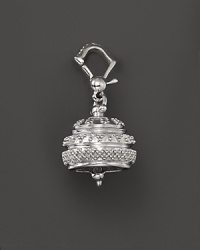 Inspired by Zen philosophy, this intricately detailed, polished finish sterling silver meditation bell from Paul Morelli jingles softly.