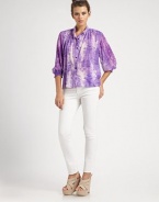 An easy-fit button-down shaped by soft pleats at the shoulders and gathered three-quarter sleeves, all in tie-dyed stretch silk.Band collarButton-down placketThree-quarter sleevesShirred cuffsShirttail hemBack yokeAbout 24 from shoulder to hem96% silk/4% spandexDry cleanImportedModel shown is 5'10 (177cm) wearing US size Small.