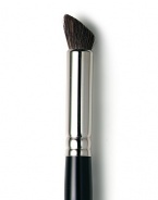 Laura Mercier's all-natural brush for colour application and blending. To contour, place the flat side upward, point into the crease and use a windshield wiper motion. Choose long handle or travel size brush. Made in USA. 