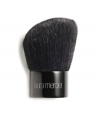 A black goat hair, kabuki-style brush with severely rounded edges and a gently cut angled head allowing for fuller coverage on the planes of the face. Ideally used with the Mineral Powder SPF 15 as well as other powder formulations. Pick up powder on the slanted face, tap off excess and buff into the skin. 