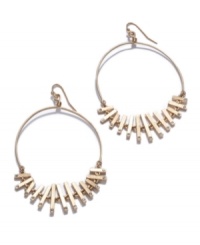 Natural elements with a glimpse of sparkle. These hoop earrings by RACHEL Rachel Roy combine graduated bone with glittering crystal in a gold tone mixed metal setting. Approximate diameter: 2 inches.