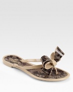 Lace print adorns this rubber slip-on for vintage appeal.Slip-on style Rubber straps and sole Made in ItalyOUR FIT MODEL RECOMMENDS ordering one half size down as this style runs large. 