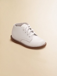 High-top lace-ups in supple leather provide excellent support and traction for youngsters' early steps. Adjustable front laces Padded insole Rubber traction sole Leather ImportedPlease note: It is recommended that you order ½ size smaller than measured. If your child measures a size 7.0, you may want to order a 6½. 