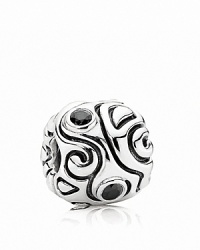 Swirling lines and bezel-set black cubic zirconia stones make this sterling silver PANDORA charm bewitching.