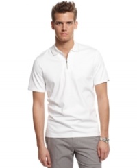 Streamline your style with this modern half-zip polo shirt from Calvin Klein.