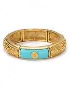 Exotic-jewels are big news this season, and T Tahari's stretch bracelet, featuring turquoise and gold plaques, is an easy way to nod to the trend. Slip it on to update your style.