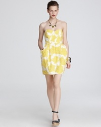 A cheerful print enlivens this Shoshanna strapless dress.