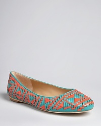 Woven color adds dynamic interest to a streamlined ballet flat silhouette by designer Rebecca Minkoff.