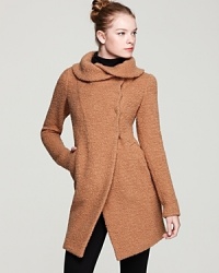 An elegant shawl collar brings a chic twist to this bouclé Dawn Levy coat blending rich texture with a sleek shape .