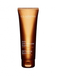 Named Best Self-Tanner in Allure magazine's Best of Beauty. Self Tanning Instant Gel. Achieve an even, golden, natural-looking tan for face and body without the harmful effects of the sun. Lightweight non-oily formula absorbs easily, providing effective results in just two hours while also helping to preserve skin's youthful appearance by promoting visibly more beautiful skin. Ideal for those who wish to maintain a year-round tanned appearance. 4.4 oz. Imported from France. 