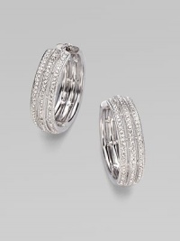 EXCLUSIVELY AT SAKS. A simple yet shimmering design offering three elegant rows of pavé crystal.Crystal Rhodium plated Diameter, about 1 Post-and-hinge back Imported