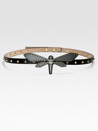 An edgy, leather design embellished with a black plexiglass dragonfly, antique gold studs and adjustable back closure.About 1.6 wideMade in Italy 