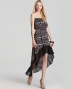 Flaunting a high low hem, Sweet Pea's lace printed maxi dress shows off its pretty pattern in classic black and white.