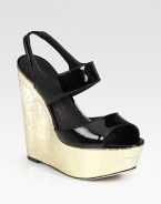 Sky-high self-covered wedge with a glossy patent leather upper and stretchy slingback strap. Self-covered wedge, 5½ (140mm)Covered platform, 2 (50mm)Compares to a 3½ heel (90mm)Patent leather upperLeather lining and solePadded insoleImported