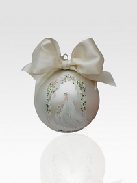 A stunning keepsake for the newlywed or newlywed-at-heart, a glimmering glass ball rendered in soft, subtle hues and finished with a hand-painted bride and an exquisite satin bow.Hand-painted glassSatin bow detail4 diam.Imported