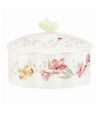 Spring is perpetually in season with the whimsical Butterfly Meadow trinket box from Lenox. Colorful blooms and butterflies on scalloped white porcelain lend country charm to any setting. Topped with a sculpted butterfly.