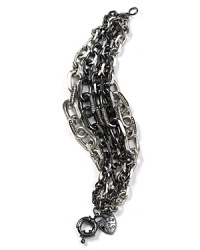 A covet-worthy take on chain, Giles & Brother's graduated silver and hematite bracelet is a cool-girl must. Worn with jersey separates or chunky knits, this accessory adds instant edge.