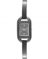 Delicate details add an air of elegance to this Nine West watch. Crafted of gunmetal tone mixed metal strap and rectangular case. Gray dial features silver tone dot markers, numerals at six and twelve o'clock, silver tone hour and minute hands, sweeping second hand and logo at six o'clock. Quartz movement. Limited lifetime warranty.