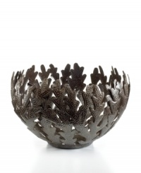 Made entirely of recycled steel, the Coral bowl is intricately cut and hammered by Haitian metal artisans to evoke the life-giving sea that laps their shores. Rich texture in its crisscrossed branches add to the special nature of each handmade piece.