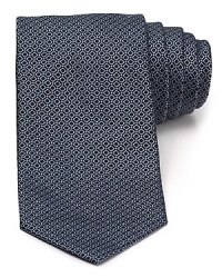 Whether you're speaking at the conference or giving a toast for a friend, this stately tie from Armani Collezioni gives your words an added authority.