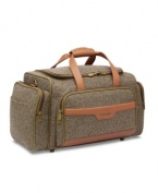 A classic duffel refined for first-class travel, Hartmann's carry-on companion is outfitted in sophisticated tweed with rich, leather accents. With plenty of packing space and a wealth of handy pockets, you'll have no problem reaching your destination. Lifetime warranty.