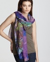 A psychedelic wave of abstract flowers decorate this luxuriously soft scarf from Bindya.