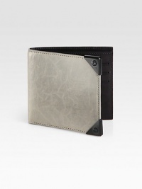 Crafted from lightly distressed lambskin leather, this sleek wallet features ample storage and the look of a well-worn favorite.One billfold compartmentSix card slotsLambskin5W x 4HImported