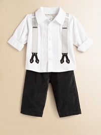 An ultra-handsome ensemble for your little man features a grown-up, button-front dress shirt and coordinating velveteen pants with attached suspenders. Shirt Shirt collarShort cuffed sleevesButton-frontPleated bodice Pants Attached suspendersElastic waistbandAngled front pocketsCottonMachine washImported Please note: Number of buttons may vary depending on size ordered. 