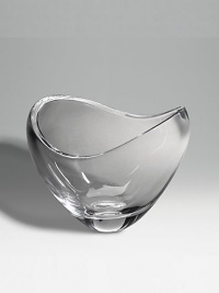 The slender slope of this crystal bowl makes it an elegant display piece. 6½H X 5½W X 5D Imported