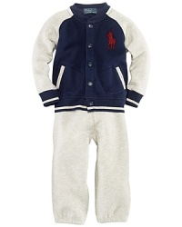 An essential preppy set combines an athletic-inspired hoodie and an athletic pant, both rendered in ultra-soft fleece.